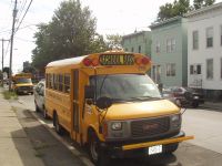 Velký snímek autobusu značky GMC, typu Mid Bus